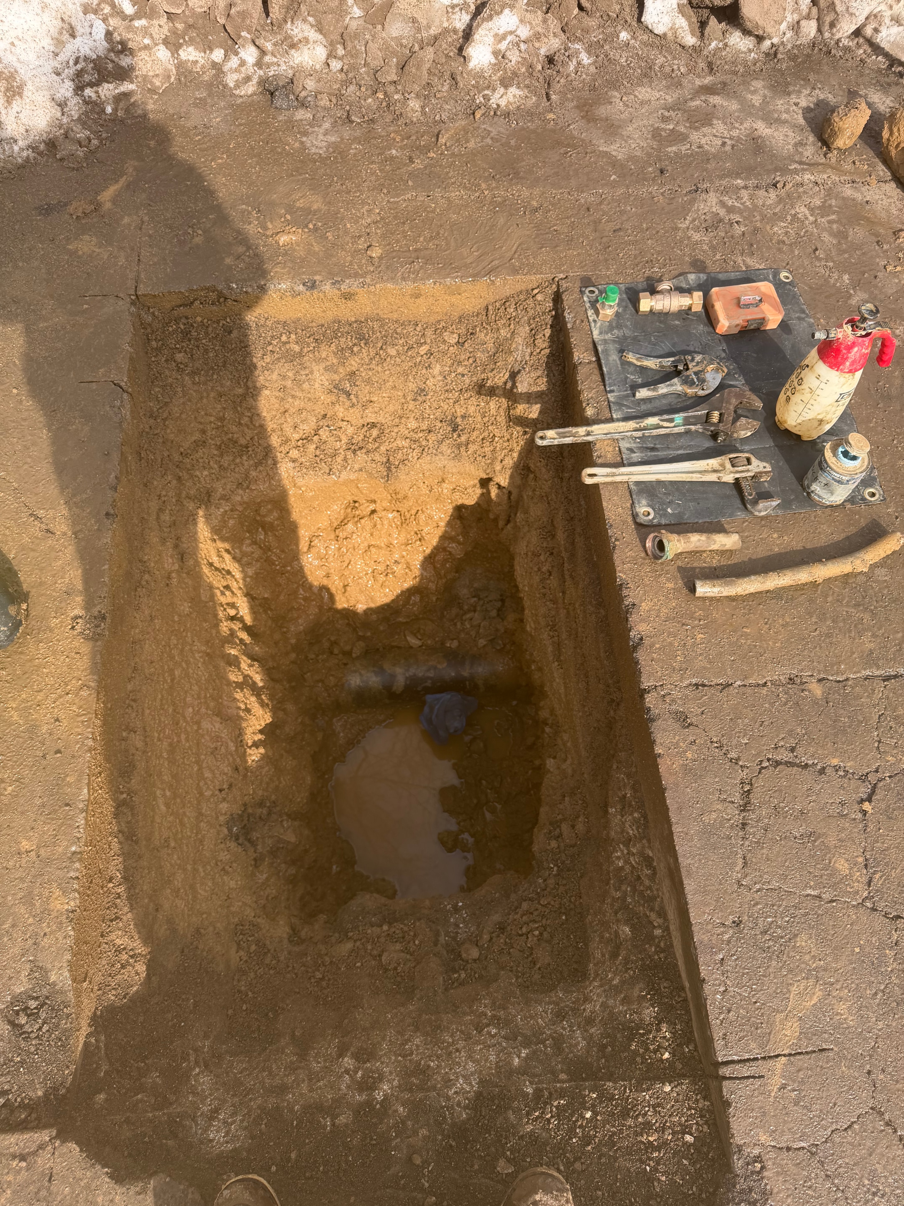 Construction trench with tools